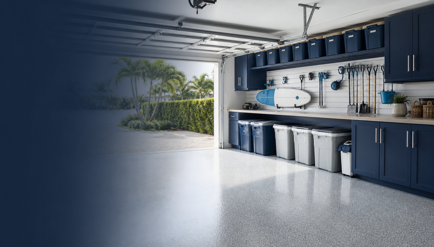 Premium clean and organized Naples garage with blue cabinets after professional service